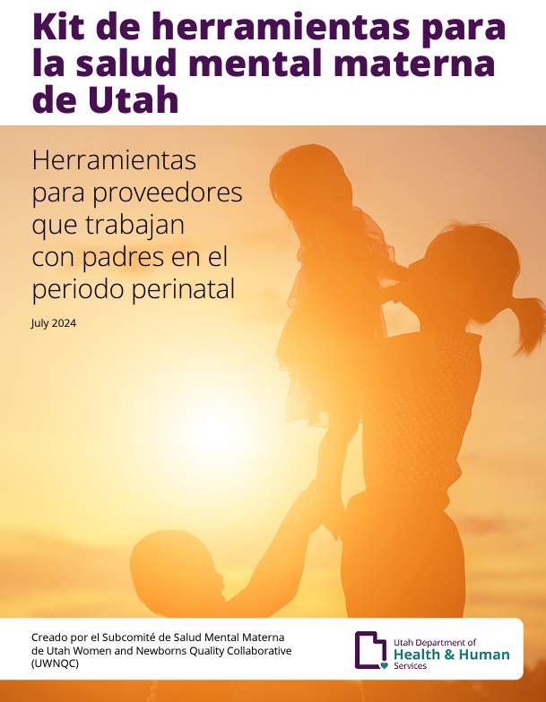 A silhouette of a mother and two children. The mother is holding one of her children up. The sun is shining in the background.